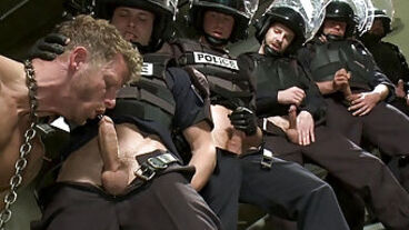 Cops Get A Blowjob From A Chained Prisoner